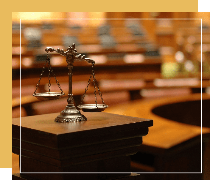 Scales of justice in courtroom - government investigations attorney