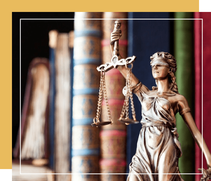 Statue of justice with scales - federal legal defense services